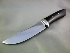 Blade was forged from an old Nicholson file and heat treated appropriately. The hilt was carved from solid 416 stainless bar stock, and the hidden tang handle is double pinned with stainless rod through a Gabon Ebony handle. 